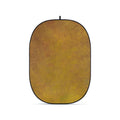 Flexible oval photo backdrop, warm brown/gold fabric with black edge and hanging tab