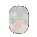Portable oval collapsible backdrop with multicolor pastel abstract print and black edge