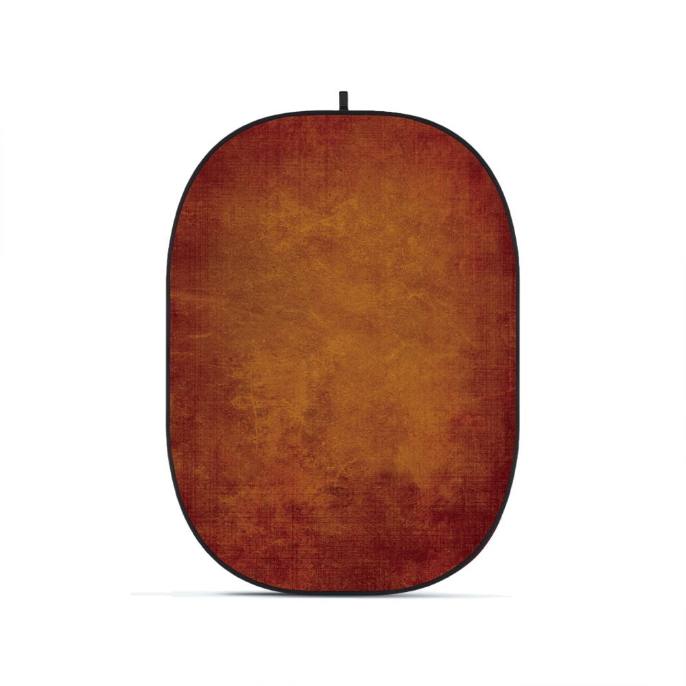 Foldable oval photography backdrop, dark reddish-brown fabric with black border