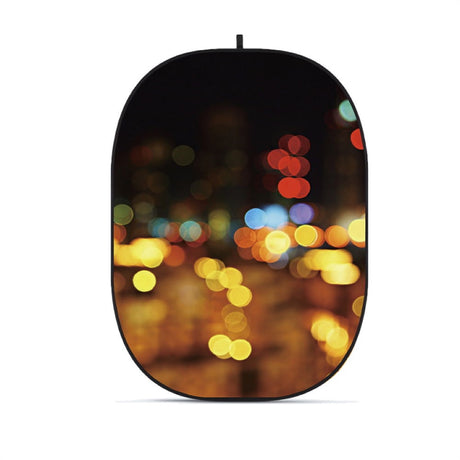 Collapsible oval photo backdrop with colorful bokeh street lights print