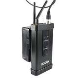 Godox LED controller box with knobs and display, connected to the panel