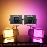 Two RGB LED panel lights on stands with visible control screens and display