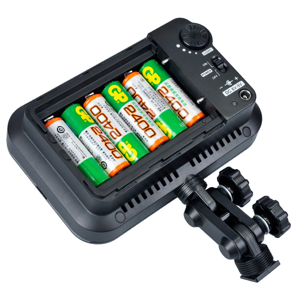 Godox LED126 with open battery compartment showing installed battery cells