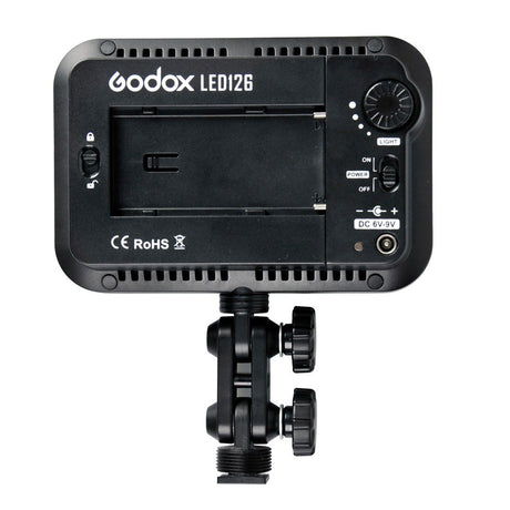 Godox LED126 rear side with controls, DC input label, and mounting bracket