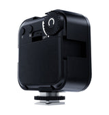Back view of square LED light with mode dial labeled F M and OFF