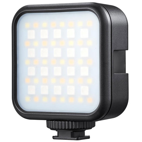 Square LED light front with glowing white diffuser and visible LED diode grid