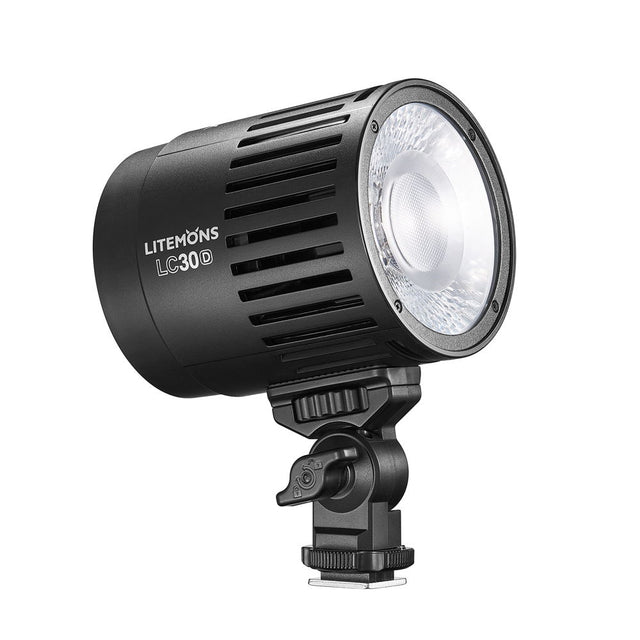 Bi-color LED video light with front reflector and adjustable mount bracket, black housing