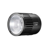 LED video light head with front lens and cooling vents, black housing