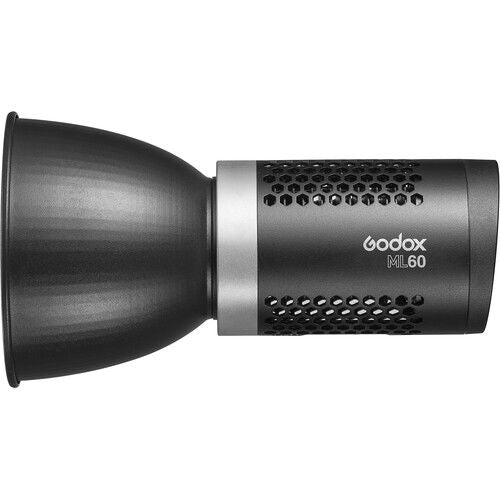 ML60 portable LED light head with black diffuser cone and vented housing