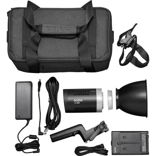 Portable LED light kit with carry bag, power adapter, cables, and reflector