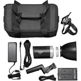 Portable LED light kit with carry bag, power adapter, cables, and reflector