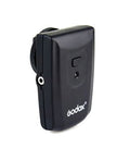 RT-16 wireless transmitter, dark gray/black handheld device with side control button