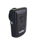 RT-16 wireless transmitter, dark gray/black handheld device with side control button