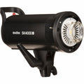 Black studio flash head with front lamp and side grip handle