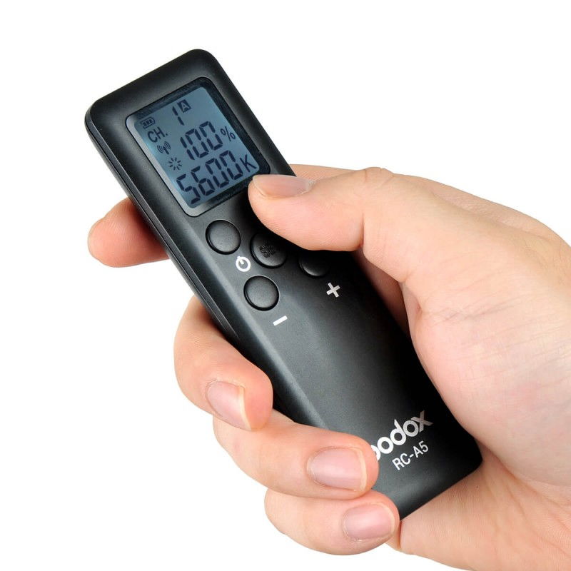 RC-45 remote control with LCD screen and buttons, shown in a hand