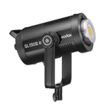 Black SL150III LED video light, front view with built-in lens and mounting handle