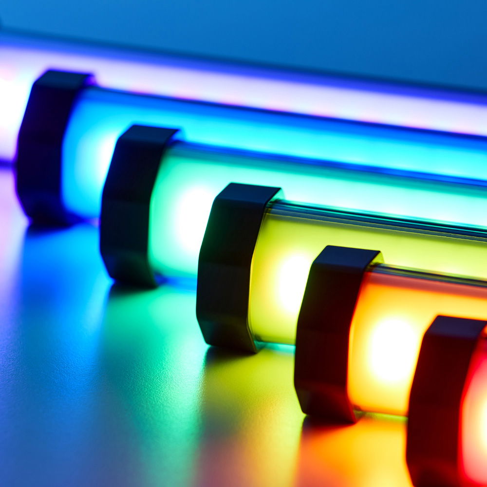 Close-up of RGB LED tube emitting blue, green, and red light