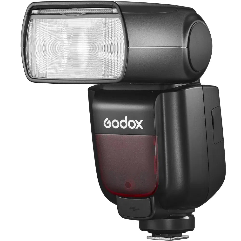 Black TTL camera flash, front view with LCD and red indicator window