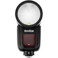 Round-head camera flash with black housing and white reflector face