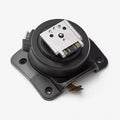 Flash foot connector with metal contacts and black mount plate