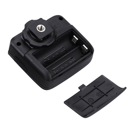 X1R flash receiver for Canon, rear view with battery compartment cover and accessory ports