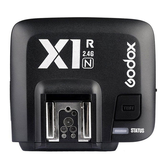 Receptor X1R pentru Nikon, panou frontal cu marcaje și buton TEST/STATUS