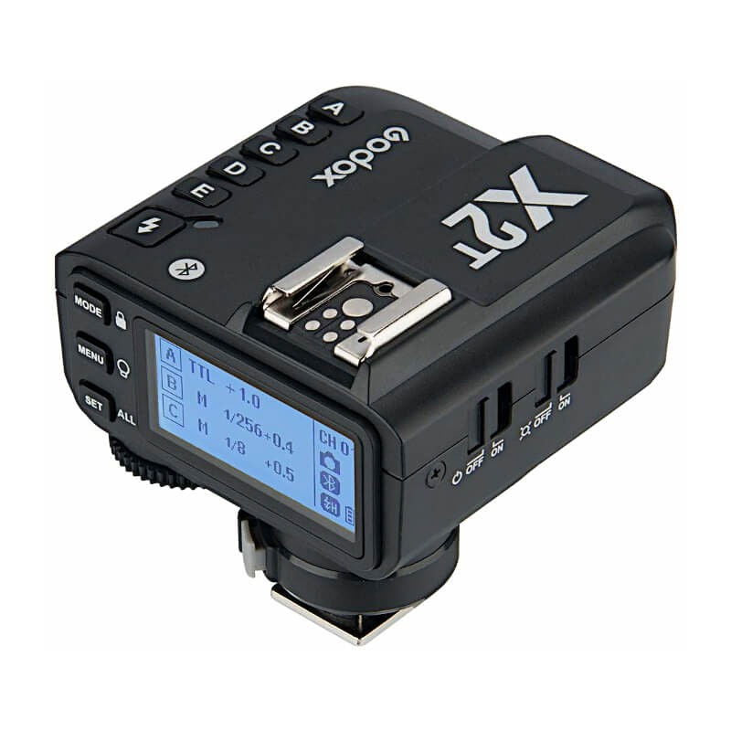 TTL wireless flash trigger top view with hot-shoe contacts, LCD, and control buttons