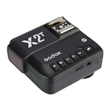 TTL wireless flash trigger side view with buttons and hot-shoe mount
