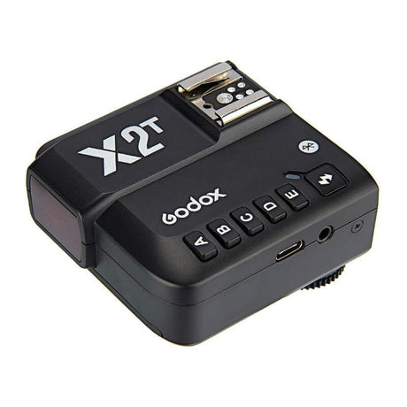 TTL wireless flash trigger side view with buttons and hot-shoe mount