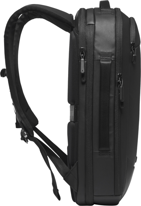 Gomatic Navigator RS Pack 15L backpack, side/back view with padded straps and vertical zip pocket