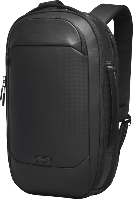 Gomatic Navigator RS Pack 15L backpack, side view with zipper pocket and padded top handle