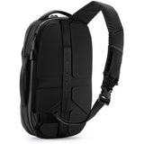 Black sling backpack side/back view with padded back panel and adjustable strap