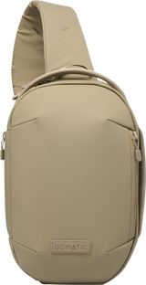 Sand beige sling bag back view with carry handle, logo patch, and rounded silhouette
