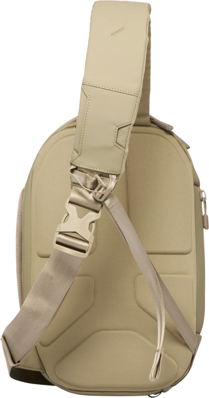 Sand beige sling bag showing adjustable buckle strap and side pass-through pocket