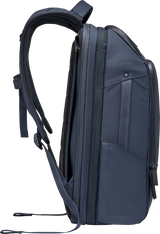 Navy travel backpack side profile with top handle, front strap, and zip pocket