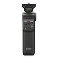 Black wireless shooting grip with control buttons and mounting shoe
