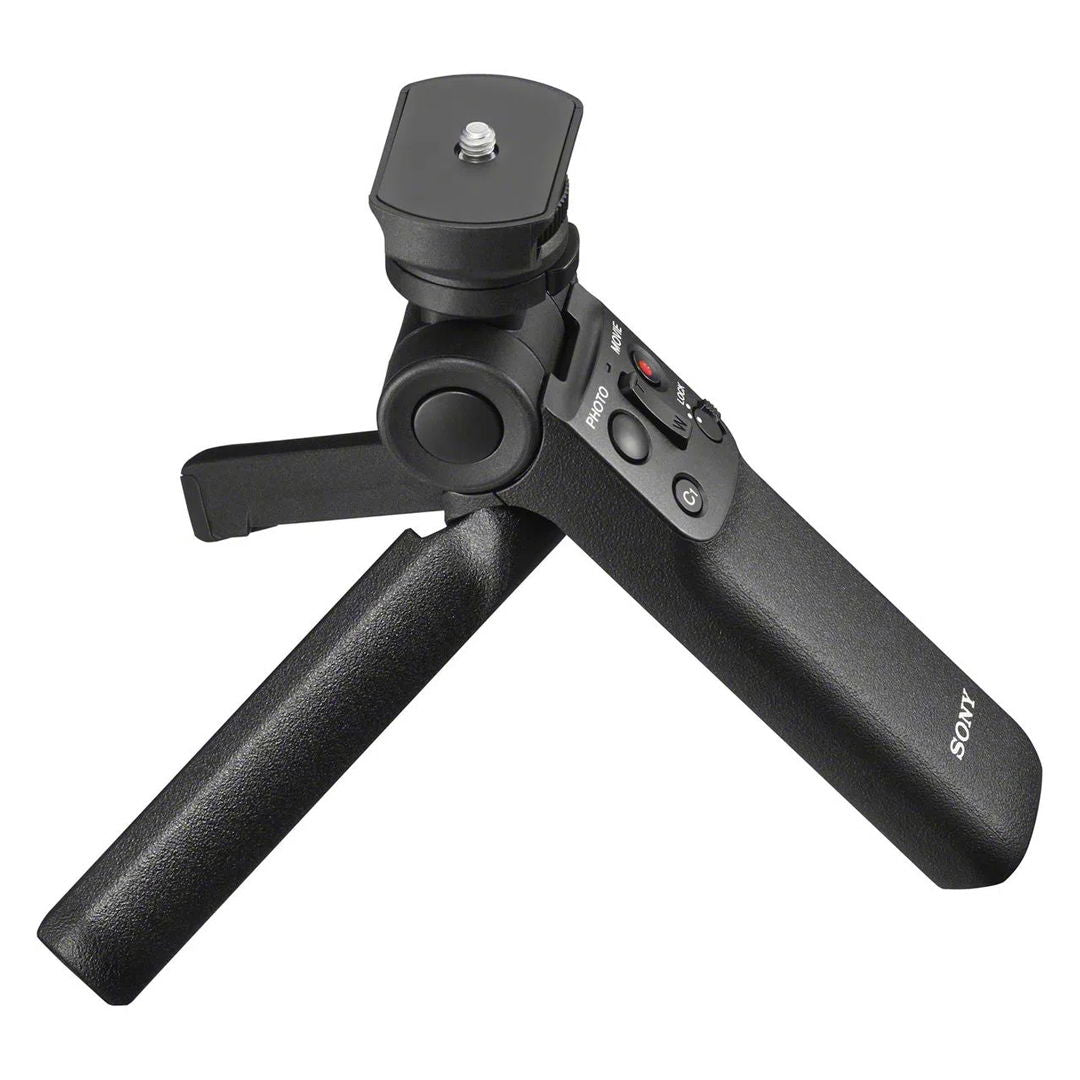 Black wireless shooting grip with compact tripod legs extended