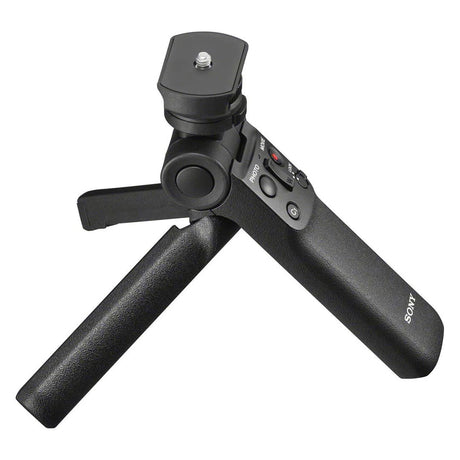 Black wireless shooting grip with compact tripod legs extended