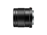 42.5mm f/1.7 MFT lens side view with textured zoom/focus grip and markings
