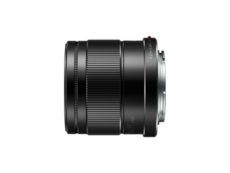 42.5mm f/1.7 MFT lens side view with textured zoom/focus grip and markings