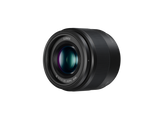 Lumix G 25mm f/1.7 MFT lens, angled front view with green-blue lens glass
