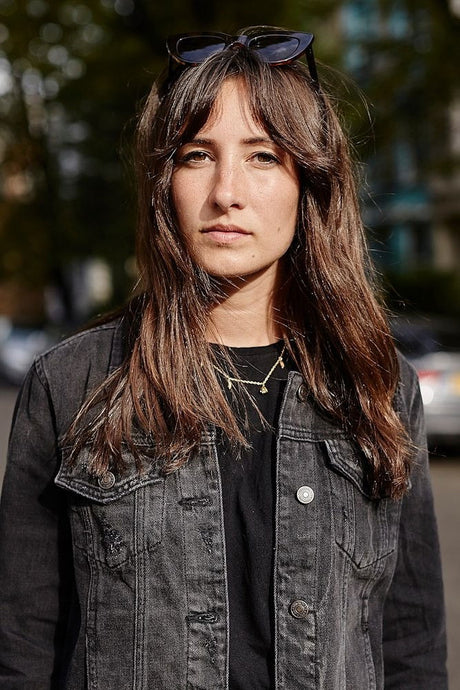 Portrait of person; diffusion reflector not visible in frame