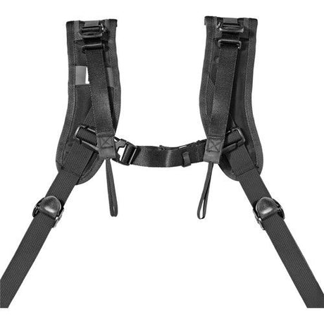 Dual-camera shoulder harness with padded pouches and adjustable side straps