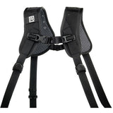 Dual-camera harness with textured padding, adjustable shoulder straps and center buckle