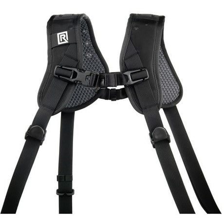 Dual-camera harness with textured padding, adjustable shoulder straps and center buckle