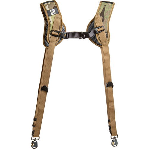Dual camera harness with central chest strap and tan webbing; camo pads