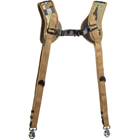 Dual camera harness with central chest strap and tan webbing; camo pads