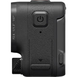 Black action camera side view showing power button and textured grip