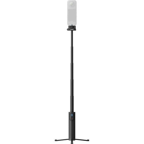 Black selfie stick with phone mount above and remote control on handle