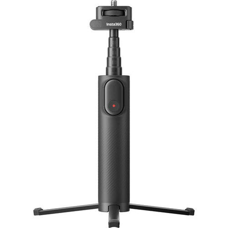 Extended selfie stick with tripod-style feet and clip-on remote control